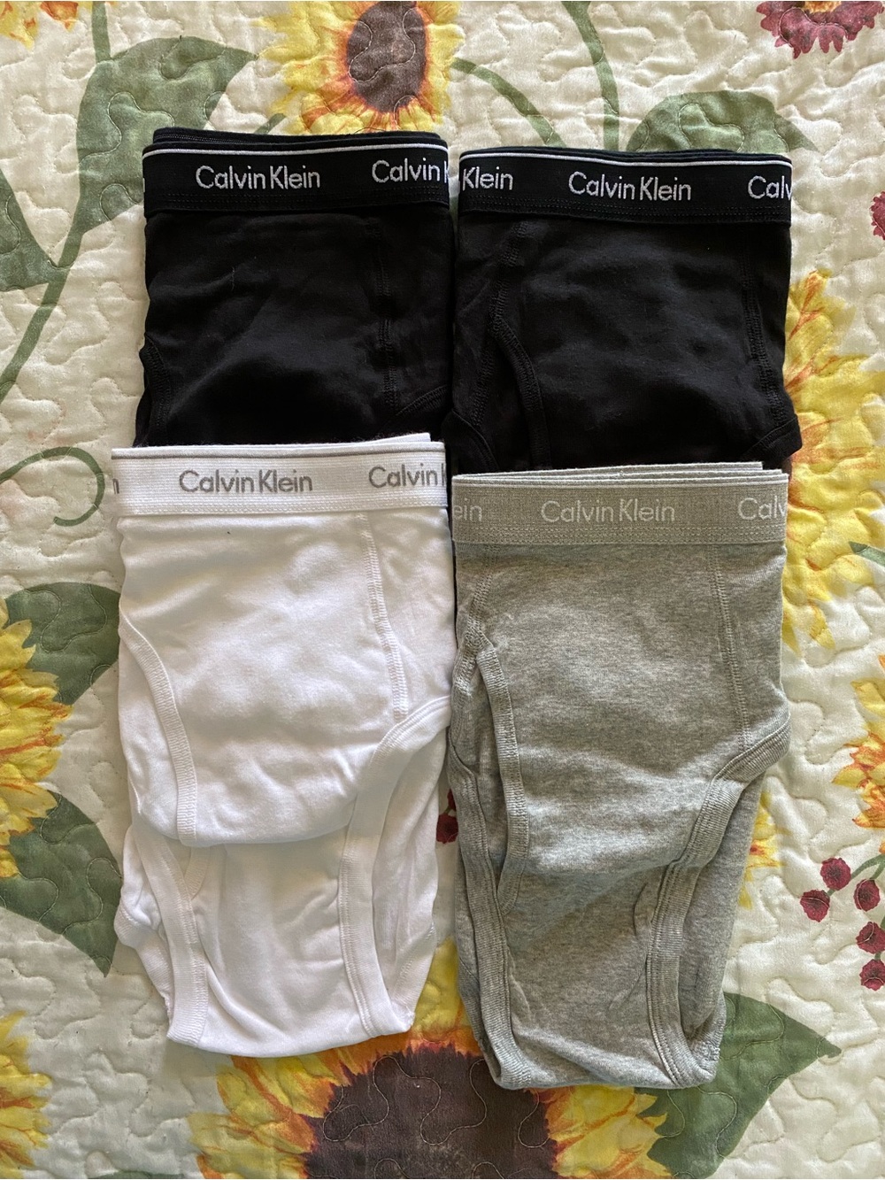 Calvin Klein Men's Brief 4-Pack in Black, White, Gray